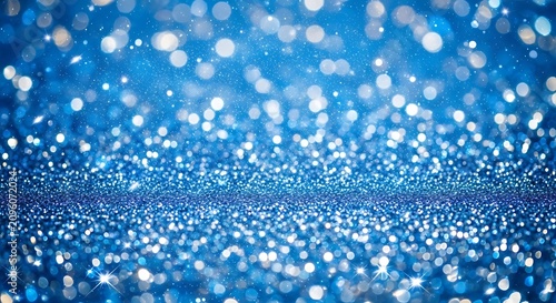 Sparkling Blue Glitter Lights Scattered Across Abstract Festive Background