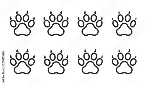 Bild auf Leinwand Collection of sharp clawed animal paw prints in linear style for wildlife identification set