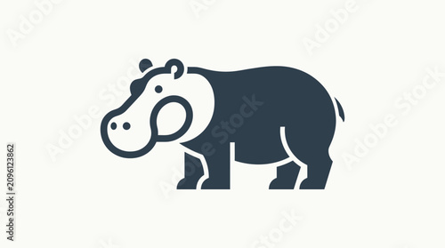 Foto Hippopotamus standing on land side view.