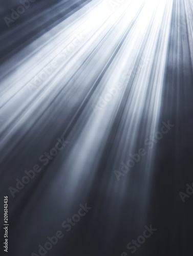 Bright light rays emanating from the right corner beams