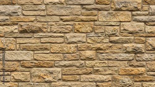 Natural Sandstone Stone Wall Background Texture.