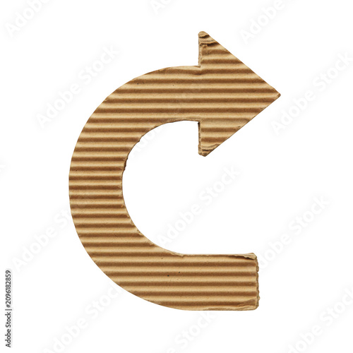 cardboard arrow on white background