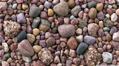 Natural brown and grey river pebbles texture background.