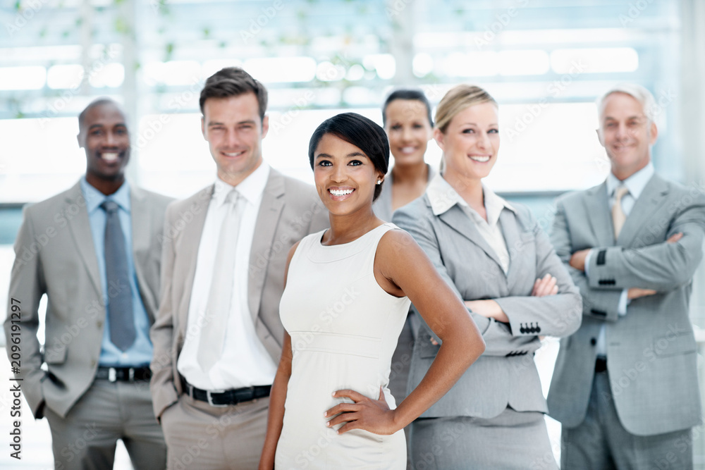 Fototapeta premium Smile, portrait or business people with group in lobby for career, about us or financial conference. Consultant, team and proud advisor in office with ambition, corporate event or opportunity