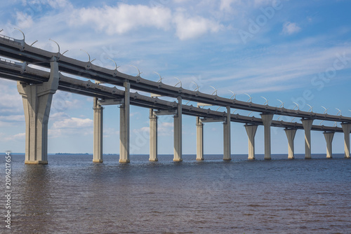 Western high-speed diameter across the Gulf of Finland against the backdrop of a beautiful sky. ZSD road on Kanonersky Island.  St. Petersburg