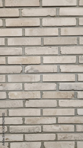 Vintage-style white reclaimed brick tiles, vintage brick tiles, reclaimed brick texture, pale-colored brick tiles, simple wall texture