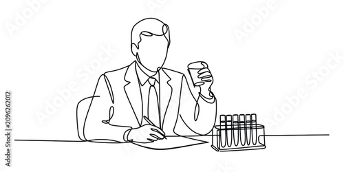 Quadro em tela Businessman in suit sitting at a desk writing on paper with a glass of water and