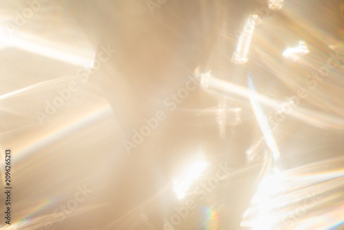 Obraz na plátně Golden light leak bokeh shimmer radiant illumination with spectrum rainbow fusion and glowing dynamic motion with layered flare and sunlight refraction