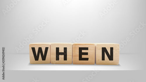 Canvastavla When wooden blocks spelling word WHEN with gray background symbolizing timing in