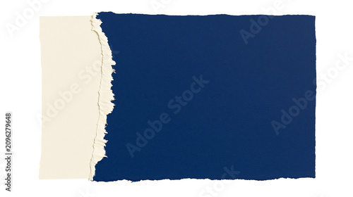 Torn cream paper overlapping a dark blue textured paper, isolated on transparent background