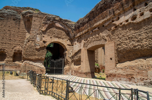 Part of the internal section with massive ancient brick walls and arches of the Baths of Caracalla in Rome, Italy