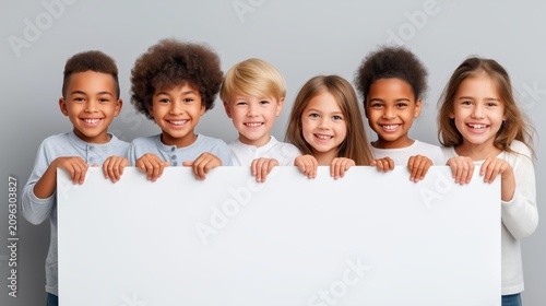 Diverse children holding blank sign in studio portrait with white background