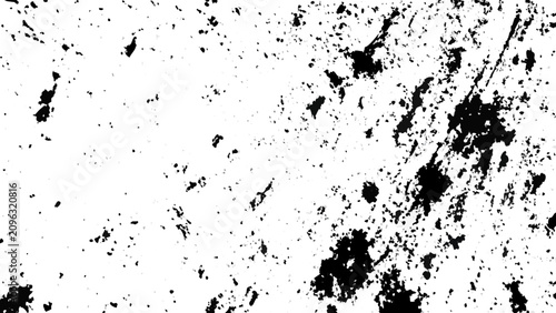 Foto Black and white grunge texture with scattered splatters on a white background ab