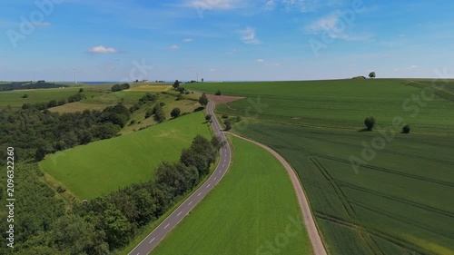 Forward Drone Flight Tracking Winding Hillside Road