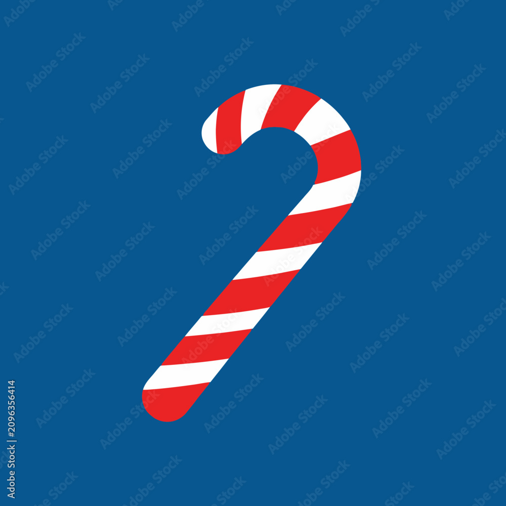 Obraz premium A festive red and white striped candy cane stands out against a solid blue background