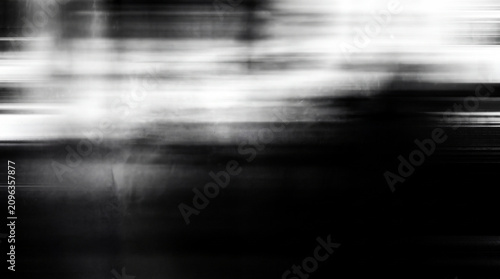 Konstfotografi Abstract monochrome horizontal motion blur texture with high contrast light stre