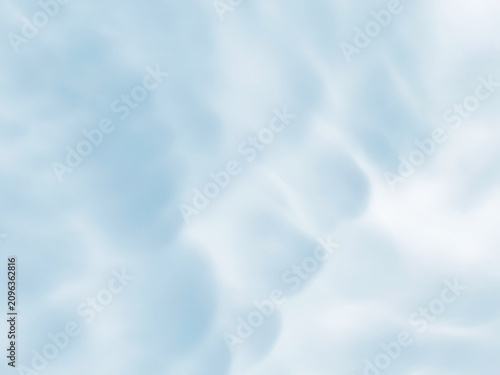 Photography Blue sky background with unusual shape lush clouds on summer morning