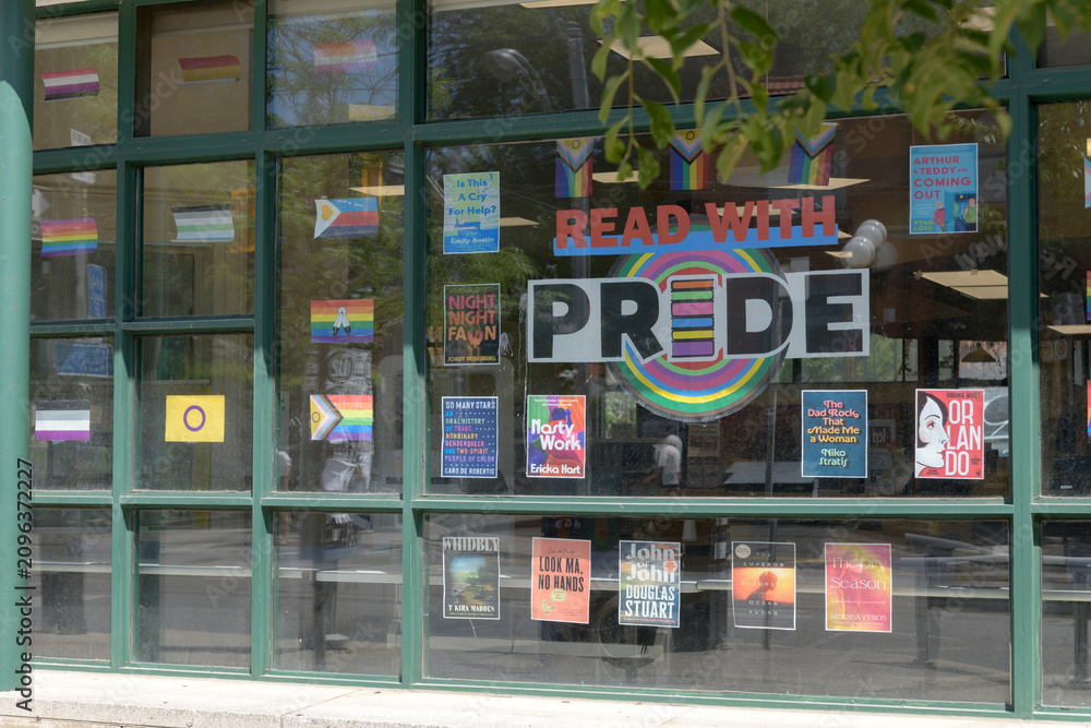 Obraz premium Read With Pride display inside windows at Toronto Public Library - College/Shaw Branch, 766 College St