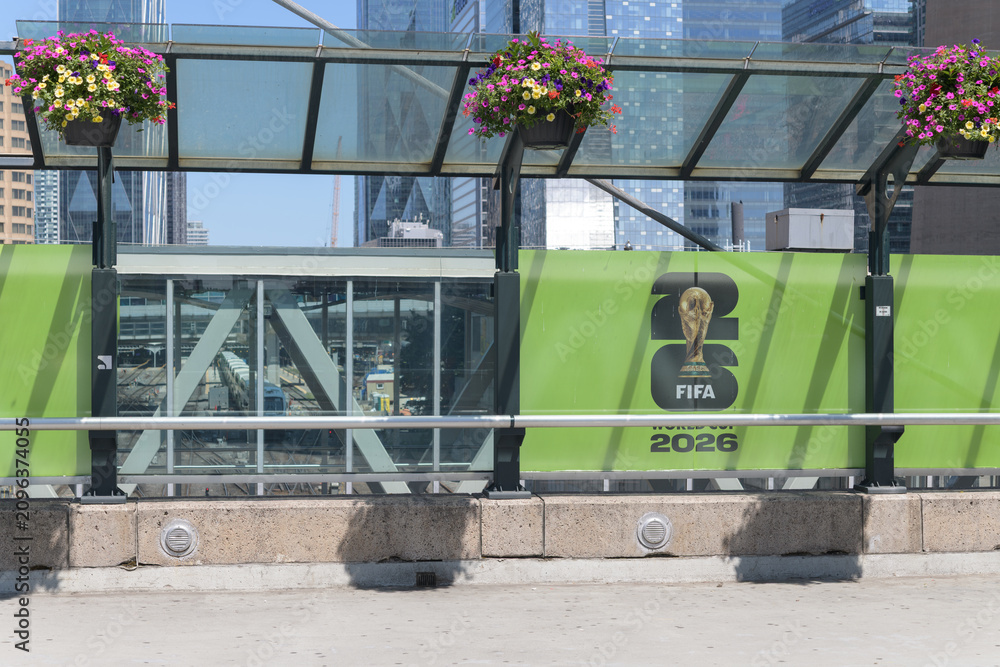Obraz premium host city banner for FIFA World Cup soccer tournament in Toronto displayed on the Rod Robbie Bridge foot of John St and the Rogers Centre