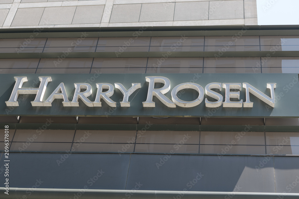 Obraz premium shop sign outside Harry Rosen, a men's clothing store, located at 82 Bloor St W, Toronto