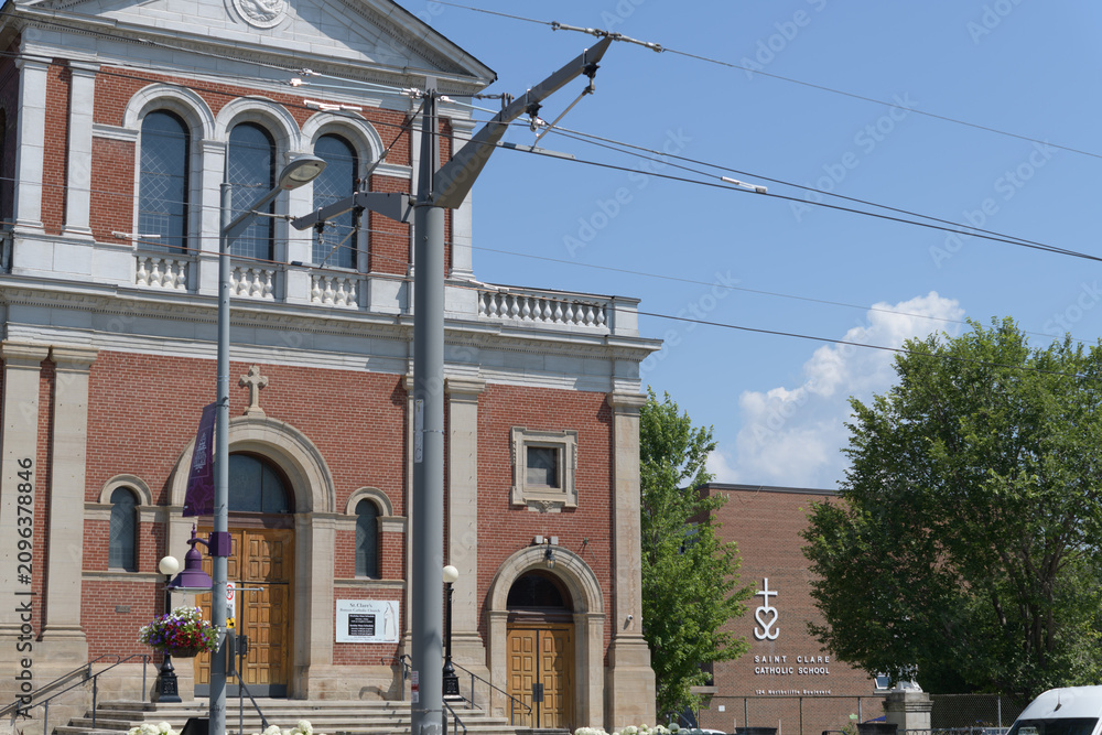Obraz premium sign on the exterior of St Clare Catholic Elementary School located on Northcliffe Blvd just north of St Clair Av W, Toronto