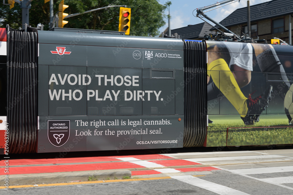 Obraz premium streetcar wrap with promotional advertising for Ontario Cannabis Store (OCS) -
