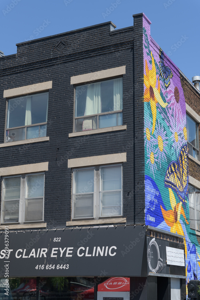 Obraz premium mural on wall of St Clair Eye Clinic, an optometrist, located at 822 St Clair Av W, Toronto