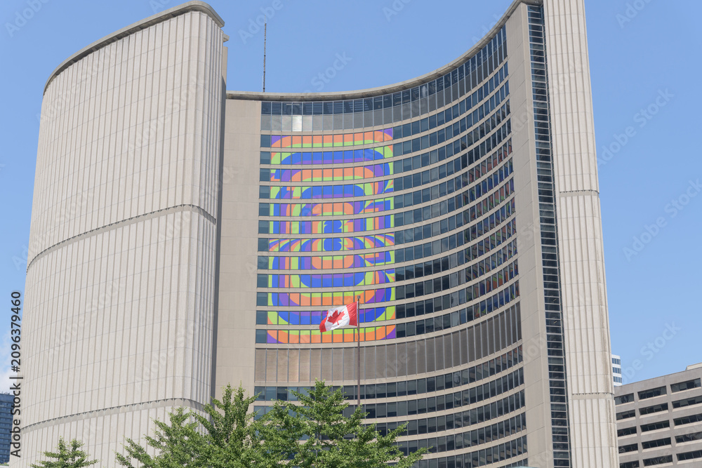 Obraz premium Toronto City Hall, a host city of the FIFA World Cup 26 with brand logo in administrative tower windows