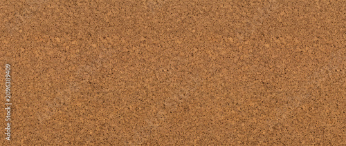 Schilderij op canvas Cork texture showcases a realistic natural brown cork surface with fine granulat