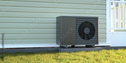 Photorealistic 3d render of a dark fictitious air source heat pump mounted to a concrete base with vibration dampers on the outside of a house.