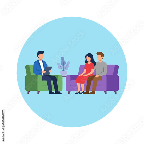 A professional counselor meets with a young couple for a therapy session