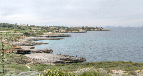 shore near Il Ponte cove, Porto Torres, Italy