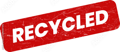 A vibrant red grunge stamp displaying the word recycled, signifying environmental responsibility and sustainable practices