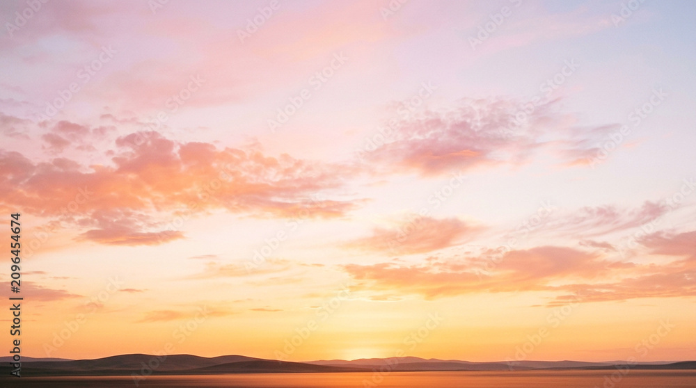 Obraz premium Beautiful Pink and Orange Pastel Sunset Over Mountains and Lake