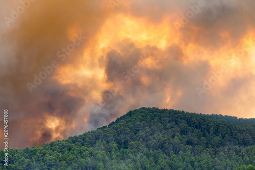 Obraz na plátně Spanish countryside devastated by a fast-moving summer forest fire incident Madr