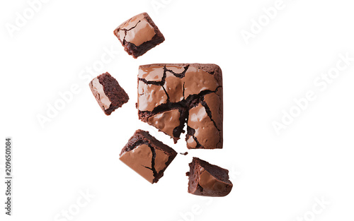 Delicious chocolate brownie pieces broken into small squares isolated on transparent background