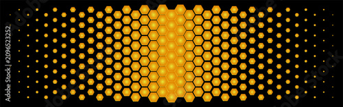 An abstract background with golden glowing hexagonal elements on a black background. The symmetrical composition of glowing hexagons creates an effect of volume, depth, and a high-tech structure.