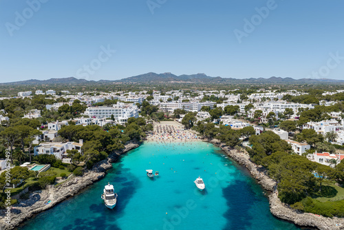 Aerial drone view of Cala Gran beach bay in Cala d'Or, Mallorca, Spain