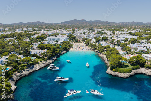 Fotografie Aerial drone view of Cala Gran beach bay in Cala d'Or, Mallorca, Spain