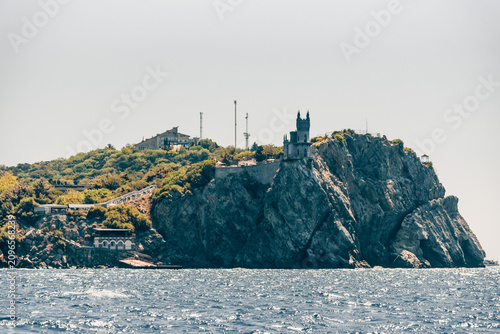 Foto Yalta, Crimea, 6 August 2020, Swallow Nest Palace on cliff overlooking Black Sea
