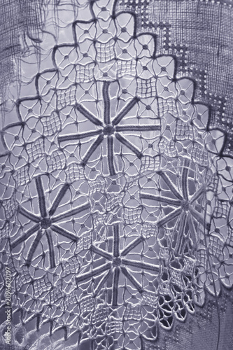 Cuadro en lienzo A detailed macro photograph of an elegant white lace fabric featuring intricate