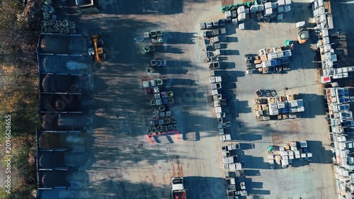 Drone overlooks a busy construction yard. Industrial chemical plant