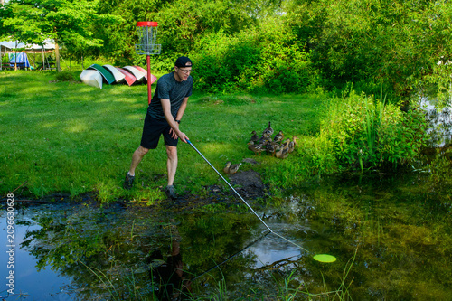 Retrieving Disc From Water Hazard