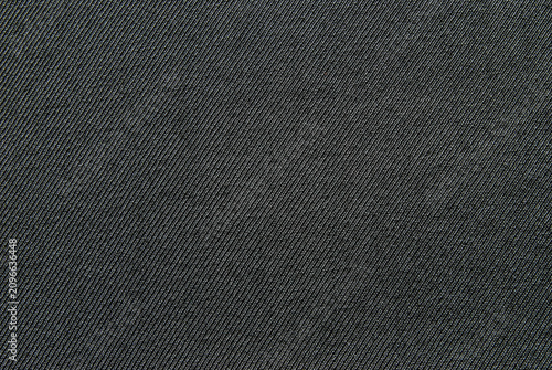 Fotografie Black wool twill fabric pattern close up as background