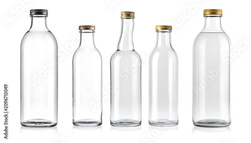 collection of empty transparent glass bottles with metal caps on a white background, isolated objects