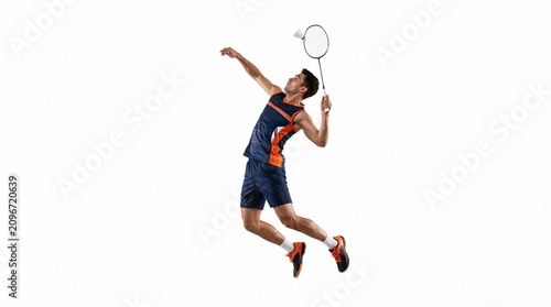 Male Badminton Player Jumps to Smash Shuttlecock in Dynamic Action Shot