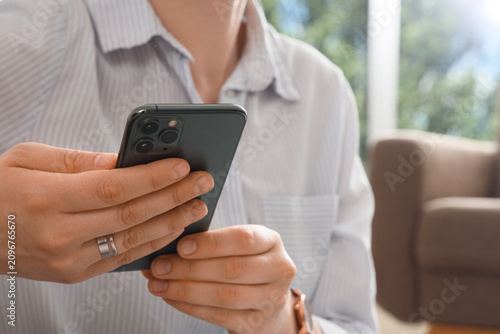 Person holding a modern sma...