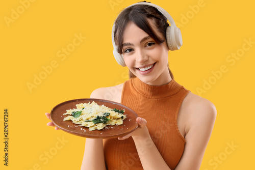Smiling young woman wearing...