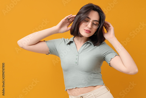 Young woman with closed eye...
