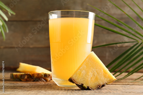 Glass of tasty pineapple ju...